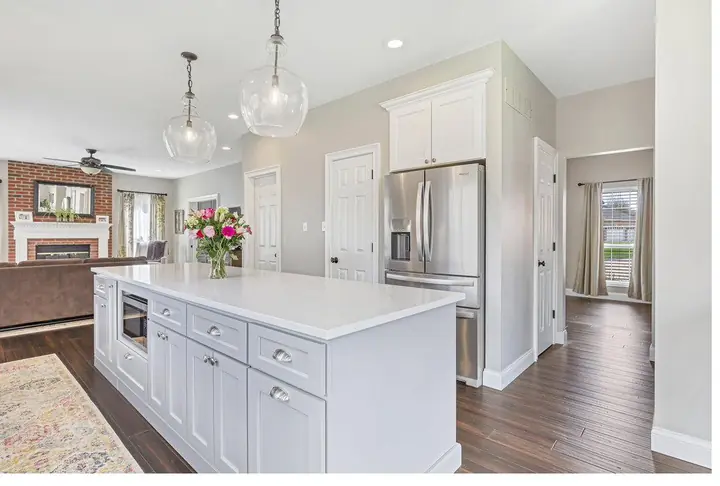 Completed white shaker kitchen island — the kind of project a consultation begins